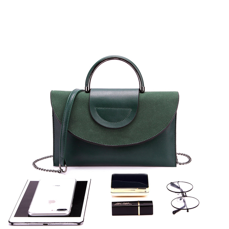 Layered flap faux leather crossbody clutch in Green