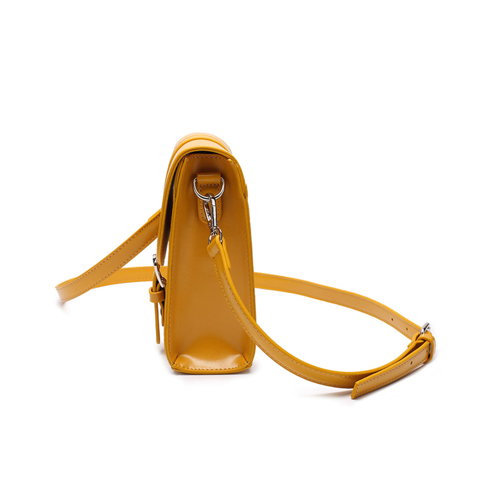 Mini faux leather crossbody bag in Mustard yellow