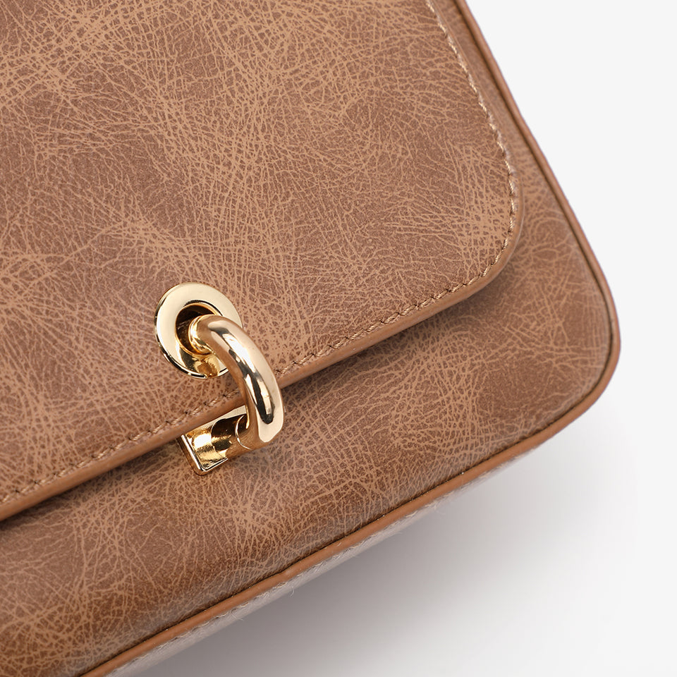 Loop turn lock boxy crossbody bag in black