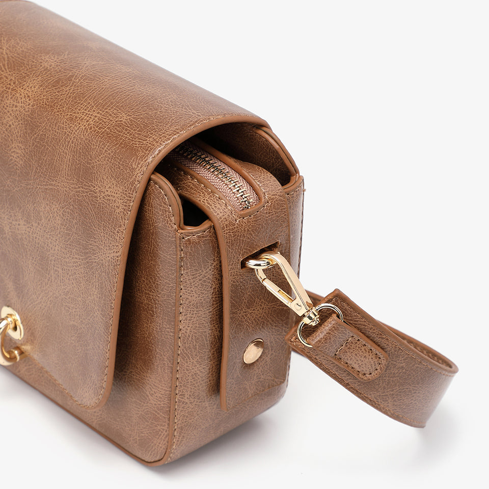 Loop turn lock boxy crossbody bag in black